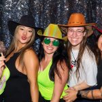 Guests enjoying the photo booth at Club Studio’s one-year anniversary celebration in San Antonio, Texas.
