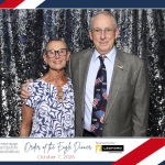 Guests enjoying the photo booth at the Order of the Eagle celebration at Blue Skies in San Antonio, Texas.