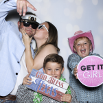 Wedding guests capturing fun memories at the Uries' San Antonio Zoo celebration.